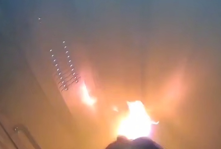 Nightmarish moment woman’s power bank bursts into flames in her handbag while she’s trapped in tiny lift