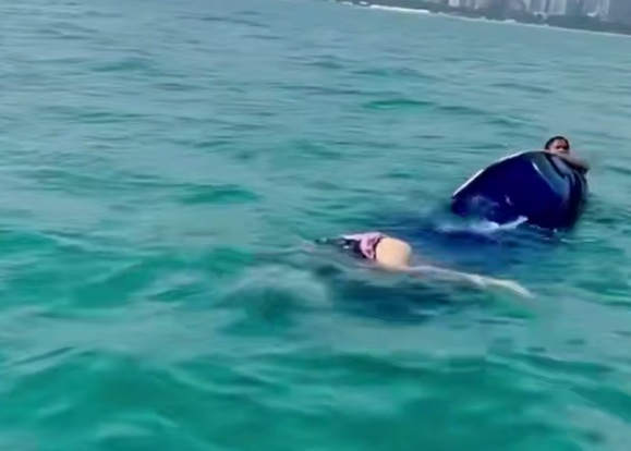 On the Brink of Death! Tourist Trapped on Jet Ski After Hair Gets Tangled: VIDEO