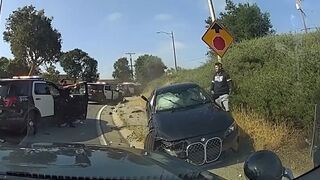 Suspect in BMW Fatally Shot by Police