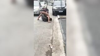 He Snatched the Wrong Purse..Woman Beats the Hell out of Him (Woman or?)