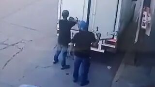 2 People Unloading Truck in the Street should be Safe Right?