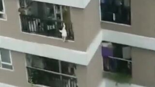 Unreal Video of 2 Year Old Falls from Building and is Miraculously Saved by Man on Ground (2 Angles)