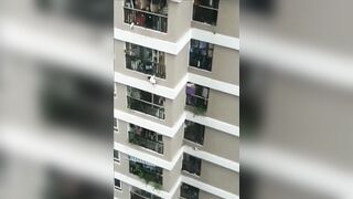 Unreal Video of 2 Year Old Falls from Building and is Miraculously Saved by Man on Ground (2 Angles)