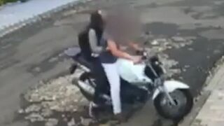 Persistent Woman will NOT Let this Man Steal Her Motorcycle for Anything...Good for Her