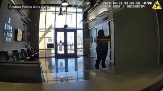 Arizona police shoot woman armed with gun in lobby