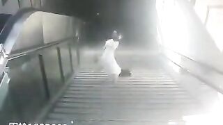 Cell Phone Woman in White Ends her Day Down the Stairs