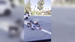 Black Man in Hawaii gets Dropped on his Head in the Street during Road Rage Fight