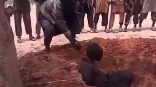 Boko Haram Militant Chops Captives Head OFF with Super Sharp Machete