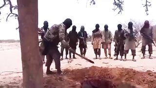 Boko Haram Militant Chops Captives Head OFF with Super Sharp Machete
