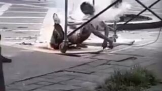 Crowd Records as man Burns Alive rom Electricity (Graphic, Watch both Angles)