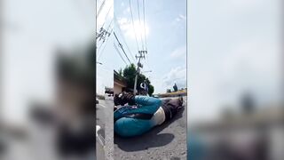 bald thug got out in a rage and brutally beat a cyclist in the middle of the street.