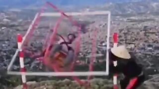 Bizarre Amusement Ride on Cliff Ends just how you Would Imagine...Death