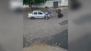 Invincible Dude on a Motorcycle Survives Head-on Collision with a Car without a Scratch
