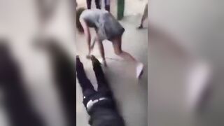 School Girl in Dress Knocks Out Black Dude in One on One Fight