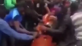 Funeral in Africa goes Wrong as Brawl Breaks Out and People Fall in the Grave