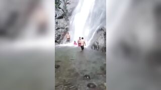 Waterfall is just Beautiful but What Comes over the Falls on these People?