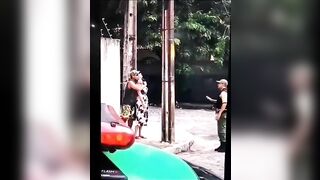 Man Holding Woman at Gunpoint has his Hat and his Head Blown Off by out of screen Sniper