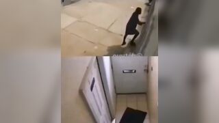 Thug Sticks his Hand in Wrong Door to Try Robbery..Can't Break In Now