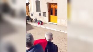 Fat Man Provokes Bull and Loses his Pants and hopefully gets a horn up his Ass