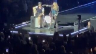Washed up Singer Madonna Shames Man for Not Standing.... Dudes, in a Wheelchair!