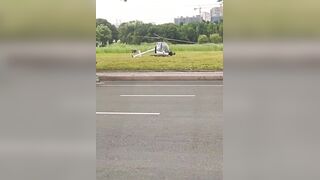 Horror moment helicopter pilot & passenger violently shaken like rag dolls inside cockpit after crashing into field