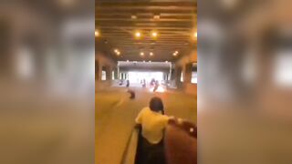 Girl in Back of Truck Witnesses Fiery Motorcycle Crash in the Tunnel