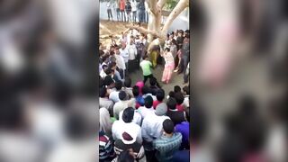 Young Girl Pinata in India Recorded from a Bird's Eye View