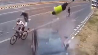 Thailand: Mountain Biker Hit so Hard he Almost hits Street Camera (See Info)