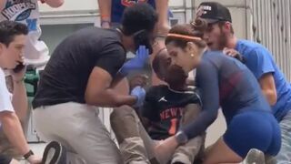 A Knicks fan passed out at the parade and got curved trying to kiss the woman who sav