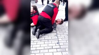 In LONDON, an African attacks a WHITE man & the Police grab & arrest the WHITE guy. .