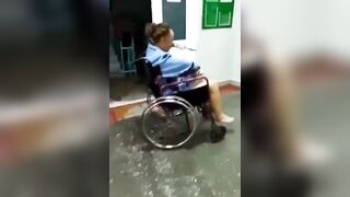 Wild: Woman in Wheel Chair has Knife Embedded through Her Head sits in Waiting Room