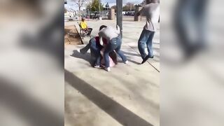 Black Dude uses a Lock in a Sock to Bash White Girl from Behind