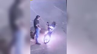 Men Desperate and not too Bright try to Put out Motorcycle Fire with Pissing On it