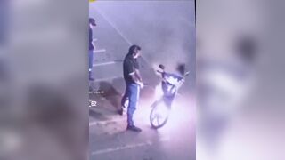 Men Desperate and not too Bright try to Put out Motorcycle Fire with Pissing On it