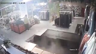Floor Collapses in Clothing Store taking out the Man and the Mannequin (China)