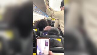 Woman Freaks out on Spirt Airlines.. Possessed?