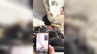 Woman Freaks out on Spirt Airlines.. Possessed?
