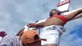 Philippine Man reenacts Christ's crucifixion on Good Friday in a bid to bring World Peace