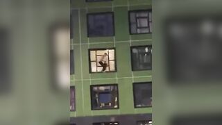Crazy Man or High throws Everything out his Apartment Window, then throws Himself out too