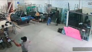 Employee can't Hold up and is Crushed by Glass Panels