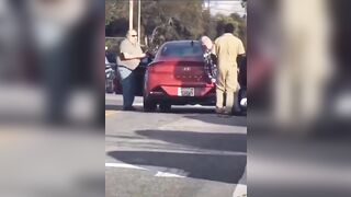 Black Man Knocks Out Much Older Lady in Road Rage Incident