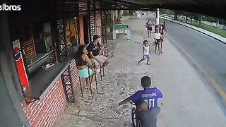 Motorcyclist loses Control and takes Everyone Out on the Sidewalk