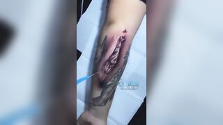 Man gets his Wife’s private's, including the Piercing Tattooed on his Forearm