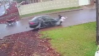 Speeding Car takes Out Girl carrying Backpack AND a Man on a Motorcycle in Same Shot