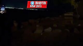 Israeli in City of Eilat. Watches Iranian Missiles Shot Down like they're Fireworks..A Little too Happy