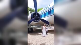 Photo Bomb of Girl and Giant Propeller goes Wrong