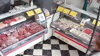 Argentina: Man working in Butcher Shop has his Credit Card Machine Self Destruct