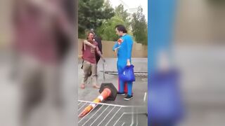Crazy Superman beats the Heck out of Man, Batman is also on Scene