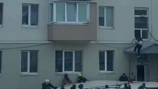 Kid avoids Rescue Pad and Lands on the Overhanging of the Building to End It