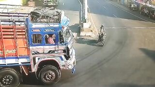 India: Man Walks directly into Truck Driver's Blind Spot (See Info for Full News)